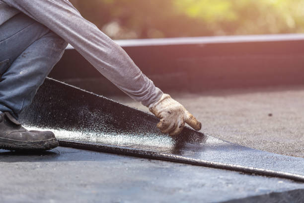 Professional Basement Waterproofing technician working in Staunton, VA